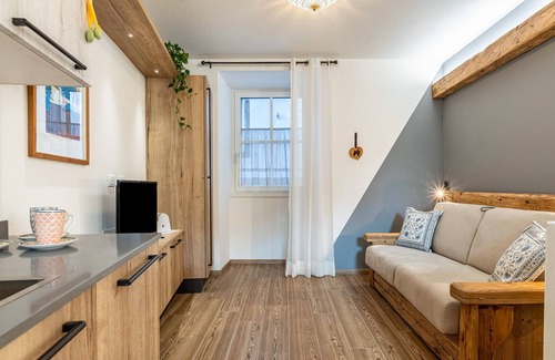 Levico Terme Apartment | Holiday Apartment 'L'Antica Corte Apt Elena' with Mountain View, Terrace & Wi-Fi