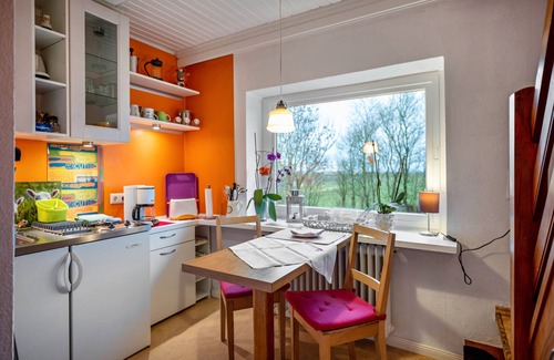 Nordstrand Apartment | Holiday Apartment 'Lila' with Shared Garden and Private Beach Chair