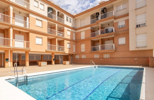 Calahonda Apartment | Holiday Apartment "Pionono Uno" with Sea View, Shared Pool & Wi-Fi