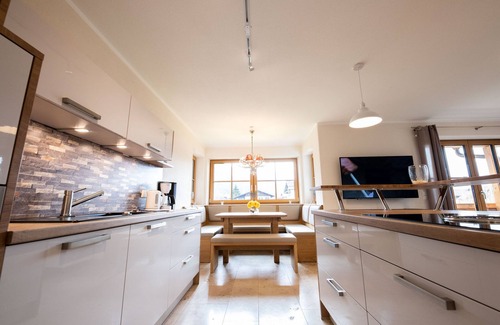 Farchant Apartment | Holiday apartment "Reiselust" in the idyllic holiday village Farchant