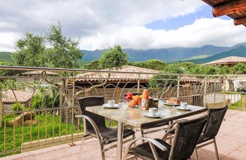 Pietracorbara House | Holiday Home Chalet Double by Interhome