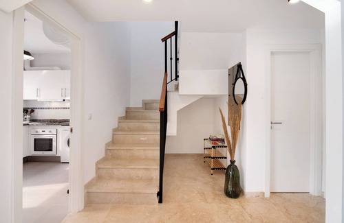 Costa Esuri House | Holiday Home 'Estrella' with Shared Pool, Wi-Fi and Air Conditioning
