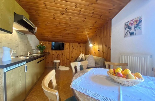Taxenbach House | Holiday Home 'Haus Wolfbachgut' with Mountain View, Balconies & Wi-Fi