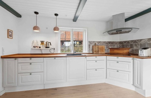 Svaneke House | Holiday home in Årsdale with sea view
