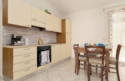San Teodoro House | Holiday Home 'Villetta Lu Lioni' with Private Terrace, Private Garden and Air Conditioning