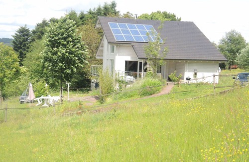 Varsberg House | Holiday home with beautiful view on the village