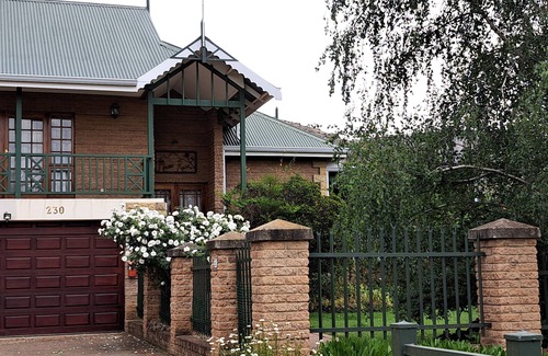 Clarens House | Holiday house priced per bedroom - 4, fenced garden, great views, walk to town