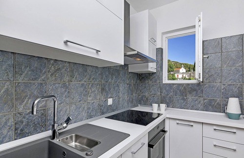 Bast House | Holiday house with heated pool, terrace with sea view, 3 bedrooms, WiFi, BBQ