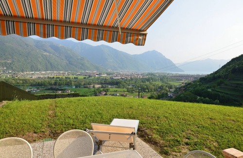 Rogno House | Holiday house terraced villa with large garden