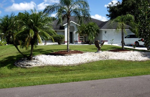 Port Charlotte Villa | Holiday villa with an extra large heated private pool and terrace area