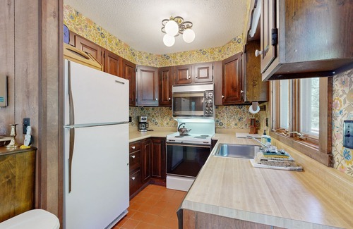 Franconia House | Home in the woods with a large deck, Ping-Pong table, & W/D