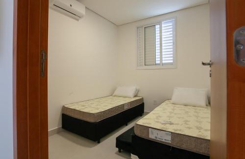 Estufa II Apartment | Home Resort Palmeiras II - proximo Praia Grande