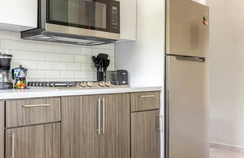 Camaceyes Apartment | Home Run Getaway! PR’s Baseball Legends, 4 mins to beach! with Backup Generator!