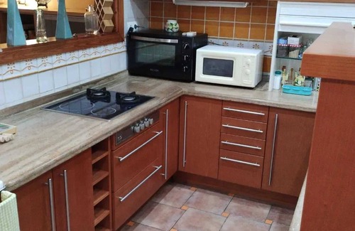 Benalmadena Costa Ski Chalet | Homerez - Chalet for 5 ppl. with sea view, garden and balcony at Benalmádena
