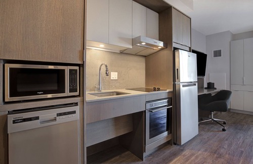 Chinatown Hotel | Homewood Suites by Hilton Montreal Downtown, QC