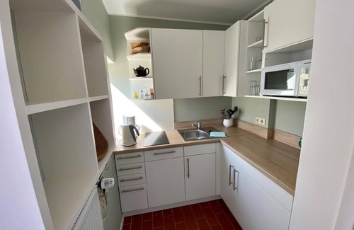 Midlum Apartment | Hook - Holiday apartment Hook - with south-facing terrace, very quiet location