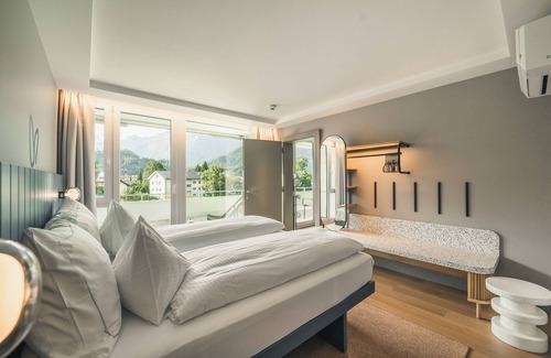 Unterseen Hotel | HOP Apartments & Suites