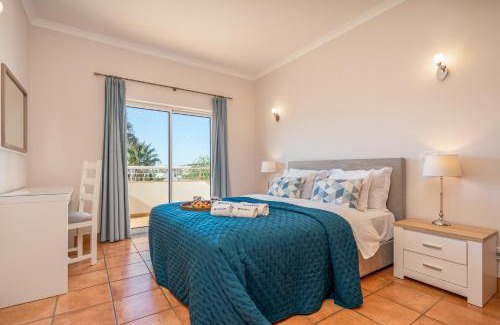 Porto de Mos Apartment | Host Wise - Bright & Stylish Lagos Flat with Pool