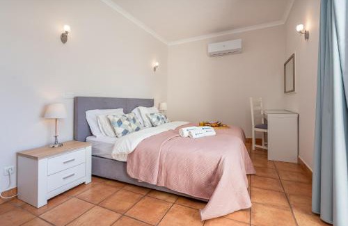 Porto de Mos Apartment | Host Wise - Bright & Stylish Lagos Flat with Pool