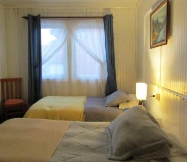 Quellon House | Hostal Casa del Tiempo