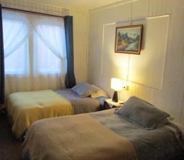 Quellon House | Hostal Casa del Tiempo