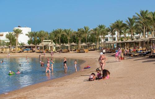 Village Road Resort | Hostgool Beach Chalets Mirage bay resort & aqua park