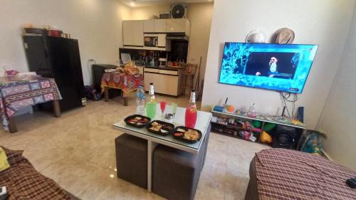 Village Road Resort | Hostgool Beach Chalets Mirage bay resort & aqua park