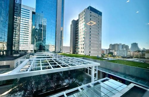 Praia de Belas Apartment | Hostly - Trend City - Praia de Belas.