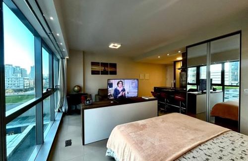 Praia de Belas Apartment | Hostly - Trend City - Praia de Belas.