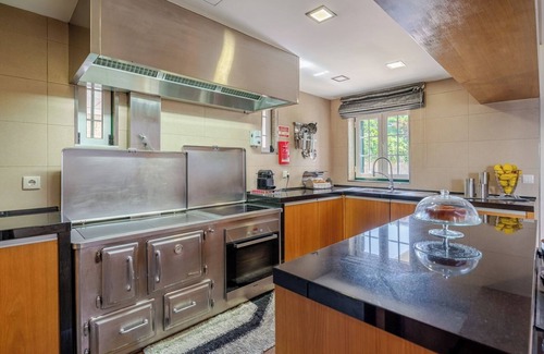 Paredes House | HostWise - Classic Villa w/Gym and Pool Access