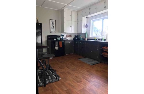 Tomah Apartment | Hot Tub! King Bed! Private & Spacious! Sleeps 3! Fully stocked Kitchen!