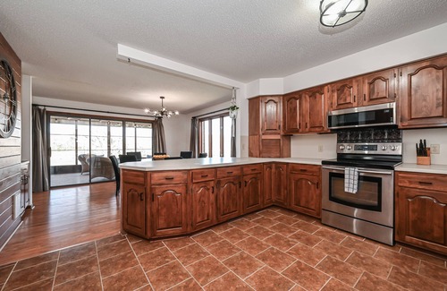Barium Springs House | Hot Tub, Lakefront, EV Charger, Screened Porch, Private Dock, Pet Friendly