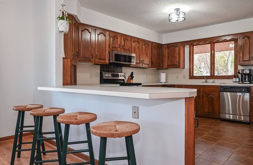 Barium Springs House | Hot Tub, Lakefront, EV Charger, Screened Porch, Private Dock, Pet Friendly