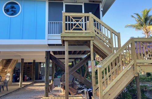 Palm Island House | Hot tub steps from the beach with private dock for fishing