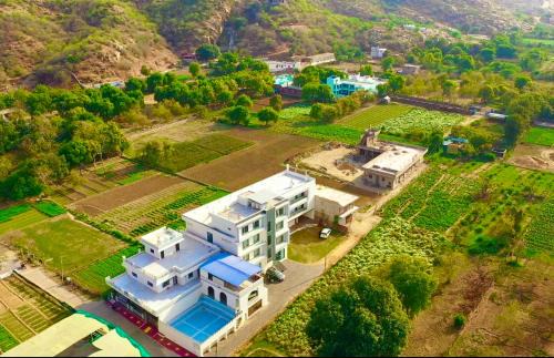 Chinnur Hotel | Hotel 777 Pushkar - with best mountain view ! swimming pool ! big parking ! lawn with bonfire ! lavish & luxury AC rooms ! top rated ! best selling ! prime location ! property of the year !