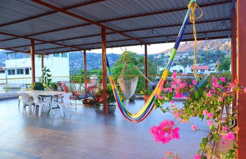 Centro House | Hotel Casa Mandarine , Amazing Private Rooms w Balcony, Rooftop, Hammocks, AC, SmarTV, 100mbs!