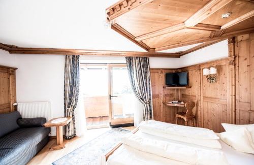 Siusi Hotel | Hotel Enzian Genziana