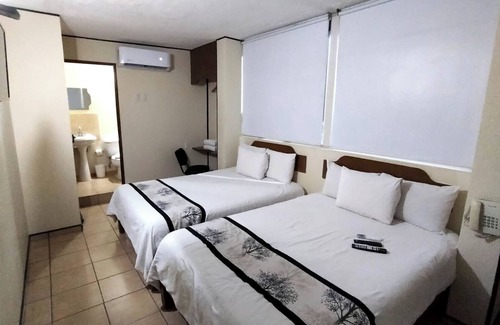 Leon Hotel | Hotel Mateos 1215