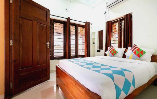 North Paravur Hotel | Hotel O ATHARVAM RESORT