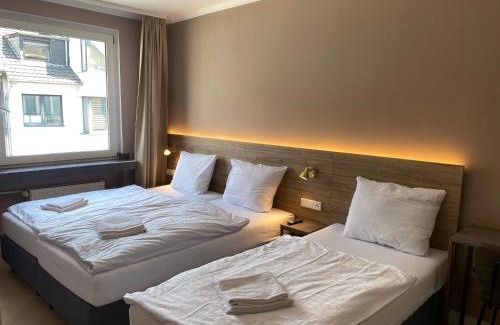 Friedrichstadt Hotel | Hotel Petite Königsallee SELF CHECK-IN