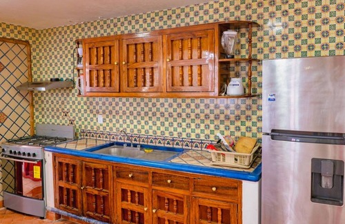 Rincon de Guayabitos Hotel | Hotel Rega Suites Guayabitos - Family & Kitchen