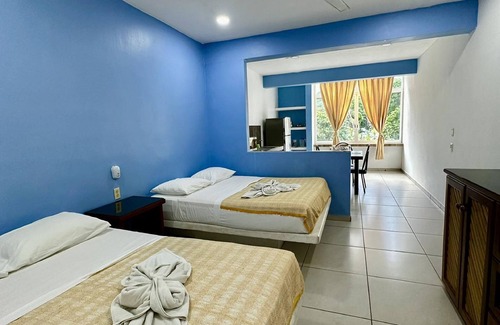 Rincon de Guayabitos Hotel | Hotel Rega Suites Guayabitos - Family & Kitchen