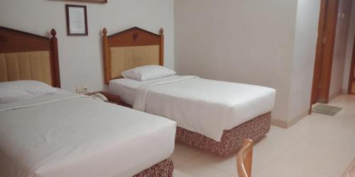 Sukaluyu Hotel | Hotel Yehezkiel Surapati Mitra RedDoorz
