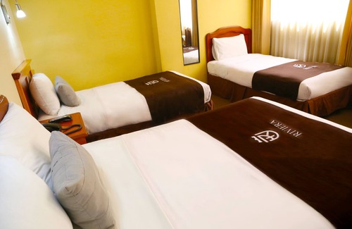 Cerro Colorado District Hotel | Hoteles Riviera Cayma
