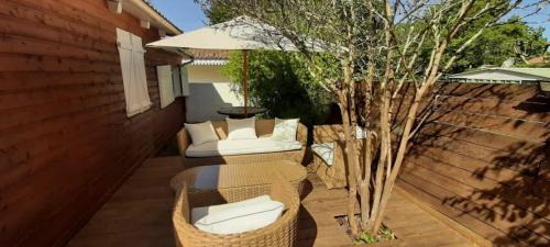 Hourtin Ski Chalet | Hourtin Charmant Chalet avec Salon de Jardin
