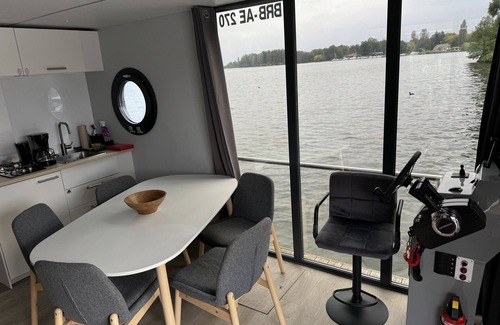 Schwerin Boat Rental | House Boat 'Hausboot Marieke Führerscheinfrei' with Lake View, Private Terrace and Wi-Fi