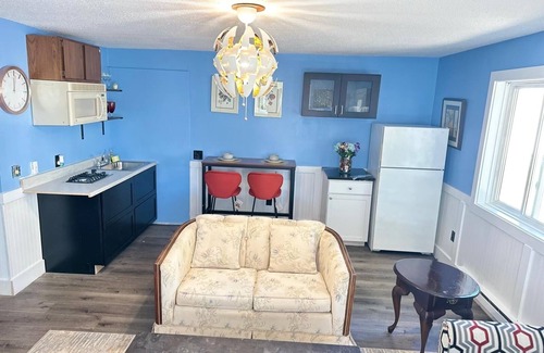 Biddeford Apartment | House dwelling that combines The bedroom kitchen and living area into one space