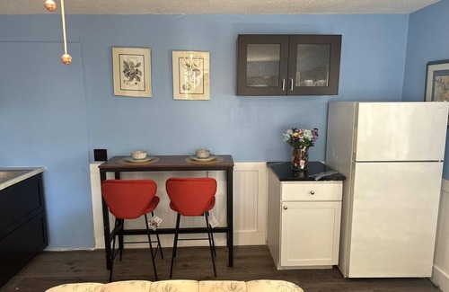 Biddeford Apartment | House dwelling that combines The bedroom kitchen and living area into one space