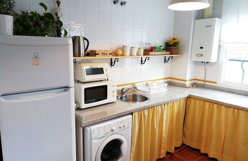 Villaluenga del Rosario House | House with two floors, 2 bathrooms, 3 bedrooms, living room, fireplace and kitchen.