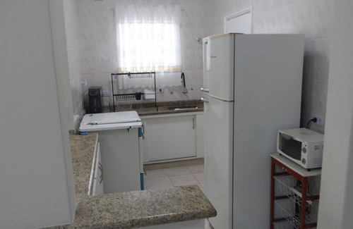 Jardim Vicente de Carvalho House | House in the center of Bertioga 300 meters from the beach - Marcondes 05.